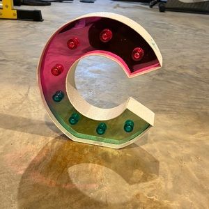 Glittery light up C from justice. Battery powered NEVER USED